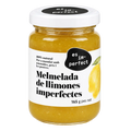 A glass jar of 'es im-perfect' brand imperfect lemon marmalade with a white lid and a white label featuring a black logo and a yellow lemon illustration.